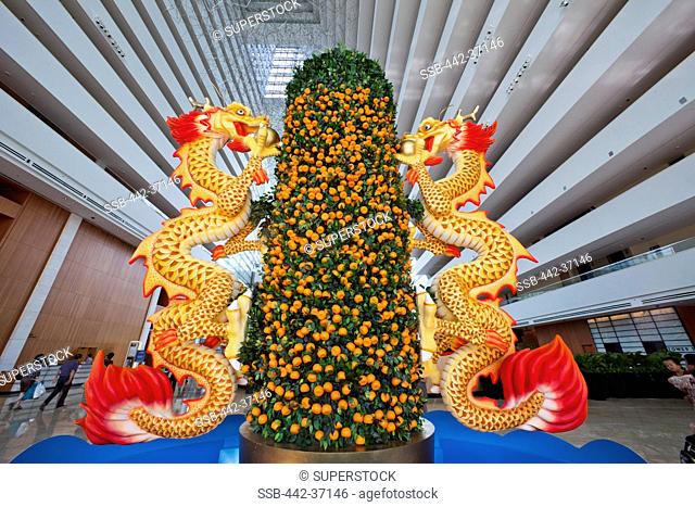 Chinese dragons and Mandarin tree at a hotel, Sands Hotel And Casino, Singapore City, Singapore