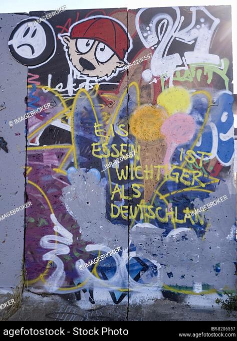 Graffiti on wall remains behind the Urban Gardening project at a new development area at the Old Harbour, Offenbach am Main, Hesse, Germany, Europe
