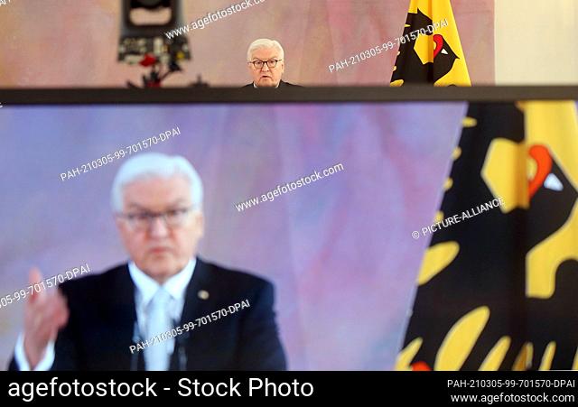 05 March 2021, Berlin: Federal President Frank-Walter Steinmeier talks to bereaved families who have lost loved ones in the Corona pandemic at Bellevue Palace...