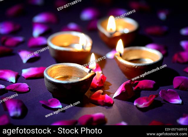 Traditional clay diya lamps lit during Diwali celebration