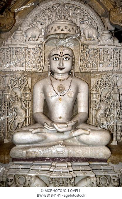 A hand carved WHITE MARBLE statue of MAHAVIRA in the CHANDRAPRABHU JAIN TEMPLE inside JAISALMER FORT, India, Rajasthan