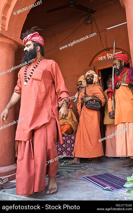 nagas, sadhus, and guard, during a meeting on hinduism in benares awaiting the shivaritri, UP, india