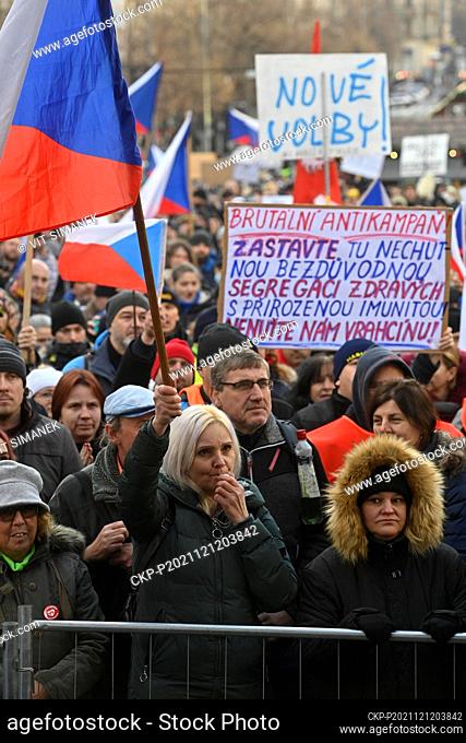 Opponents of anti-epidemic measures have gathered at a rally in Prague's Wenceslas Square on Sunday, December 12, 2021, to protest against compulsory COVID-19...