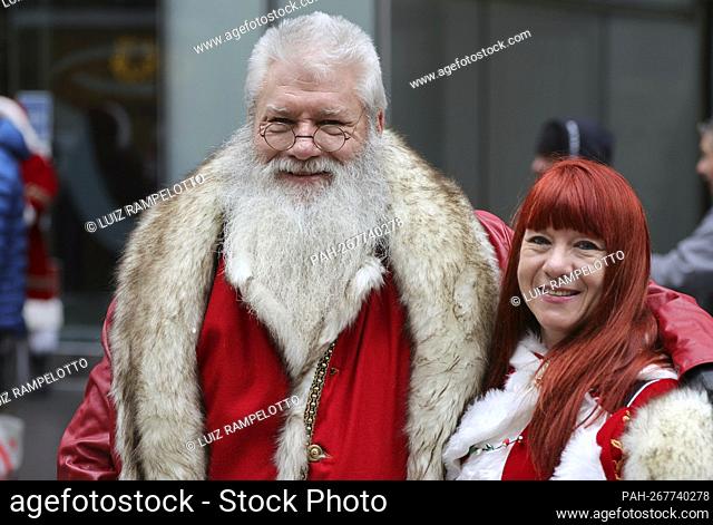 New York, USA, December 11th, 2021 - Several thousand Santas roamed the streets of Midtown the East Village in New York City celebrating Santacon 2021