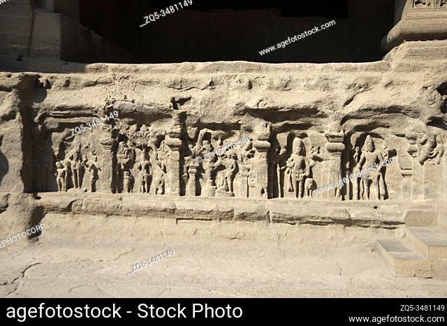 Ellora Caves, Aurangabad, Maharashtra, India Rock-cut cave temple No. 16 (Kailasa) North side, showing gods and goddess on the plinth. Closer -View