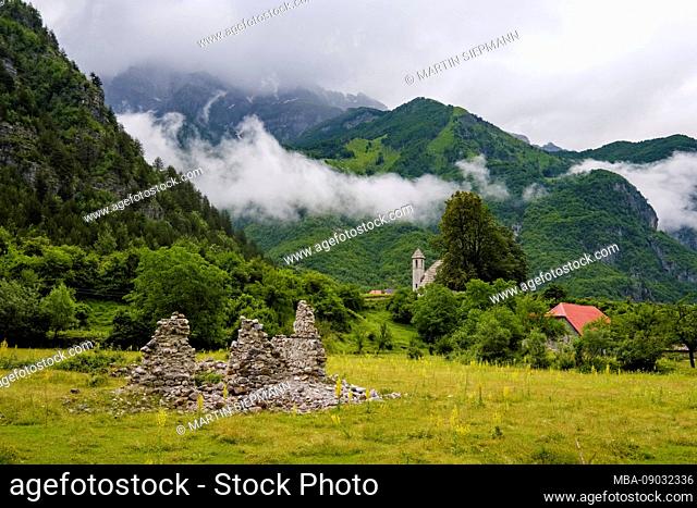 House ruin and catholic church in Theth, Theth National Park, Albanian Alps, Prokletije, Qark Shkodra, Albania