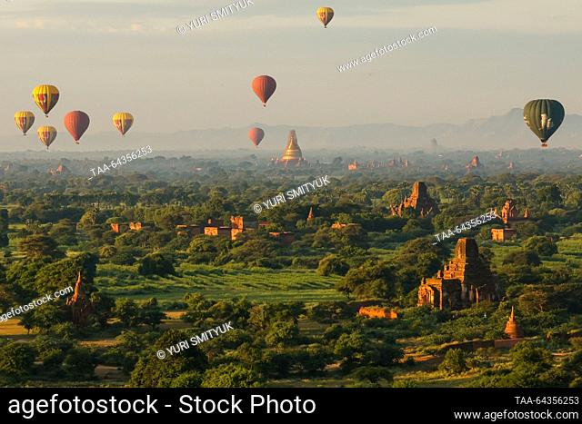 MYANMAR, BAGAN - OCTOBER 29, 2023: Balloons are seen over a Buddhist temple complex at sunrise. Yuri Smityuk/TASS