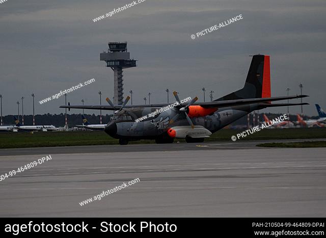 04 May 2021, Brandenburg, Schönefeld: A Bundeswehr Transall lands at BER Airport. The specially painted C-160 Transall lands for the first and probably last...