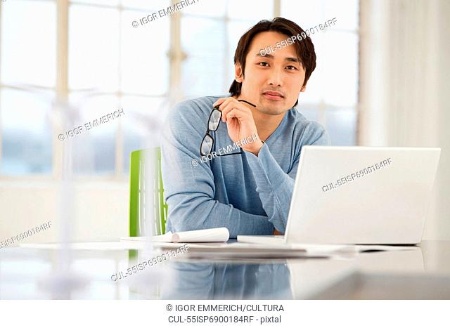 Businessman sitting at desk working
