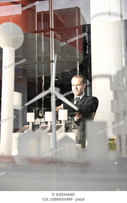 Businessman looking at an architectural