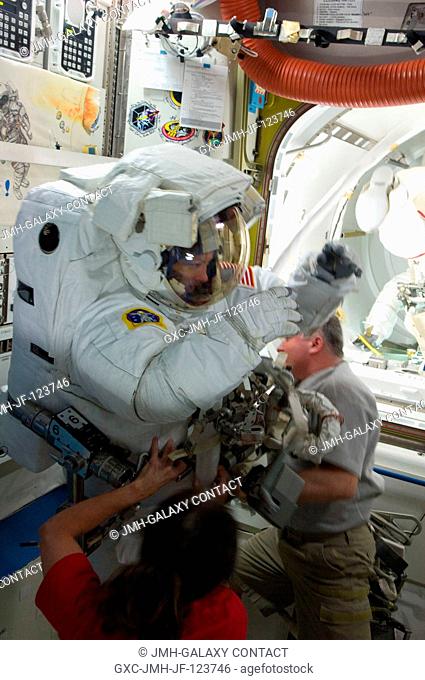 NASA astronaut Tracy Caldwell Dyson, Expedition 24 flight engineer, attired in her Extravehicular Mobility Unit (EMU) spacesuit