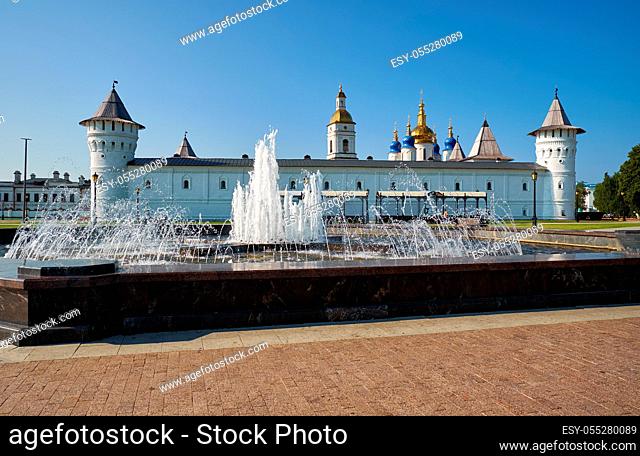 The view of the Fountain on the Red square with the Seating courtyard of Tobolsk Kremlin on the background. Tobolsk. Russia
