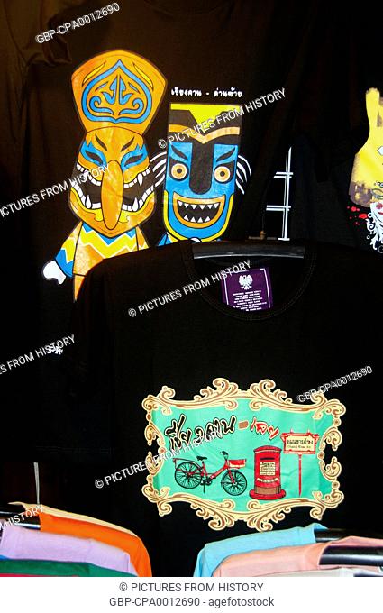 Thailand: Locally made T-shirts including one with Phi Ta Khon masks for sale on Chai Kong Road, Chiang Khan, Loei Province