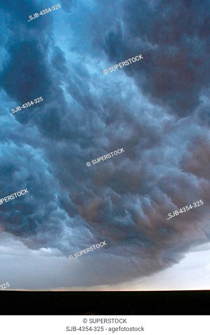 Reverse Side of a Shelf Cloud Broils Across the Sky