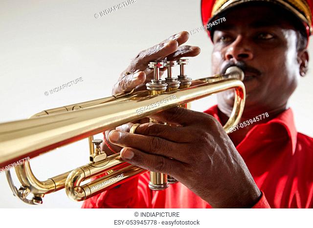 Close-up of bandmaster playing on a trumpet