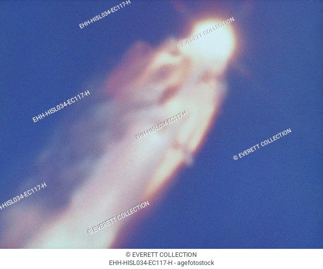 Space shuttle Challenger disaster. Challenger is completely engulfed in a fiery flow of escaping liquid propellant. Jan. 28, 1986
