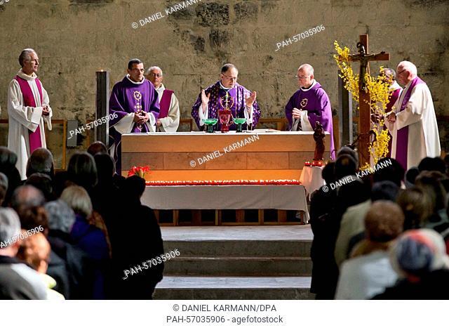 The Bishop Jean-Philippe Nault (C) holds a commemorative service in the Cathedral Notre-Dame-du-Bourg in Digne-les-Bains, France, 28 March 2015