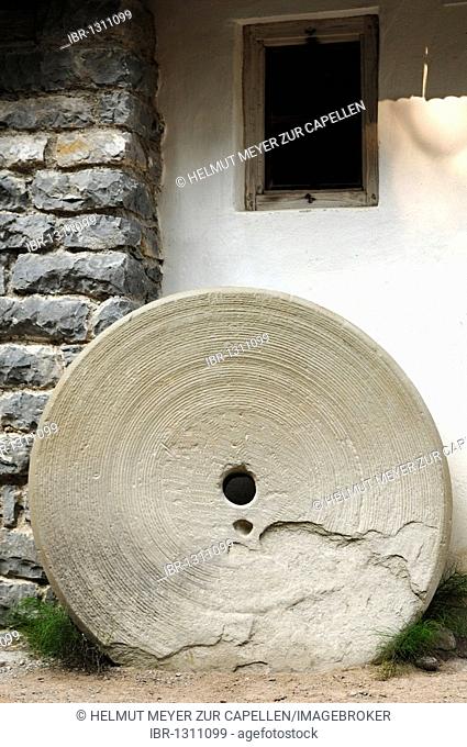 Old millstone of a hammer mill from Degerndorf, 1700, outdoor museum, Freilichtmuseum Glentleiten, Glentleiten 4, Grossweil, Upper Bavaria, Germany, Europe