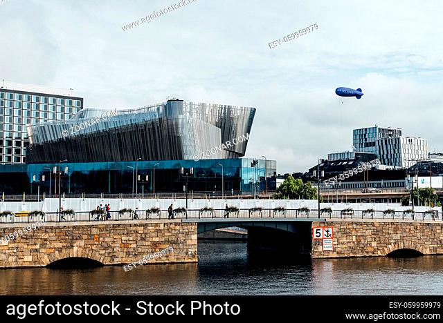 Stockholm, Sweden - August 9, 2019: Cityscape with Stockholm Waterfront Congress Centre and airship