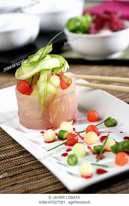 Melon and watermelon cubes with swordfish and wild green asparagus