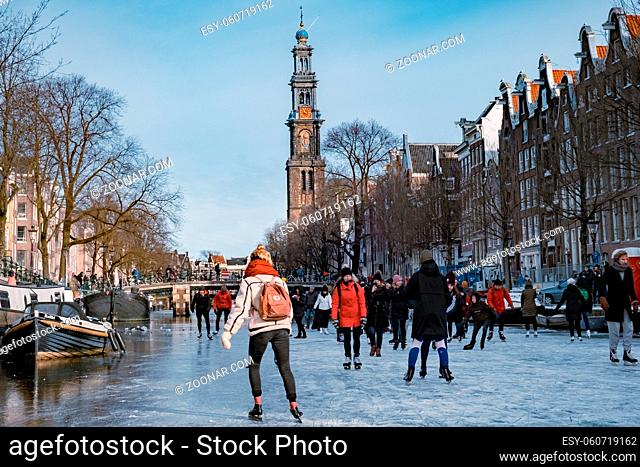 Amsterdam Netherlands February 2021, Ice skating on the canals in Amsterdam the Netherlands in winter, frozen canals in Amsterdam during winter