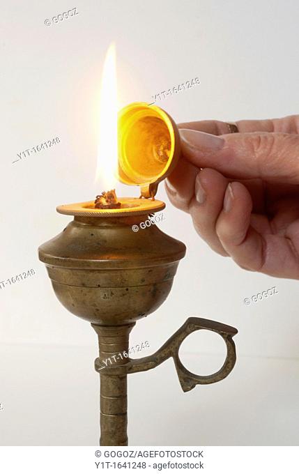 Oil lamp with flame, object