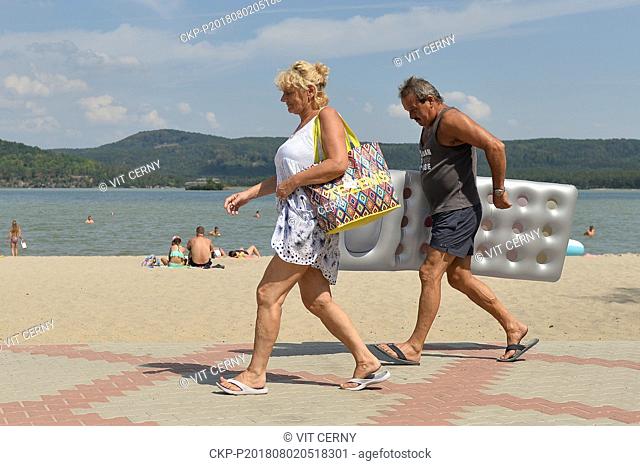 The series of tropical days continues in the Czech Republic with temperatures of up to 38 degrees Centigrade and people enjoy sun bathing and swimming in Lake...