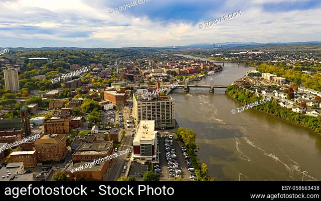 Tugboat and Downtown Troy NY in Rensselaer County along the banks of the Hudson River