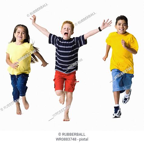 Portrait of a boy shouting and running with his friends