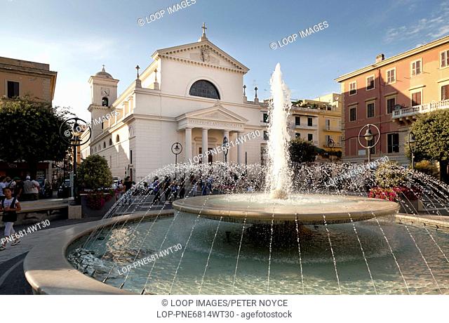 The Fountain in the Piazza Pia and the Chiesa dei Santi Pio e Antonio church at Anzio in Italy
