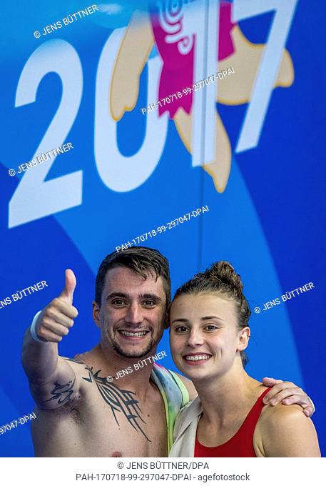 Laura Marino and Matthieu Rosset from France celebrate after winning the 3m/10m Platform Team Event Finale of the FINA World Championships 2017 in Budapest