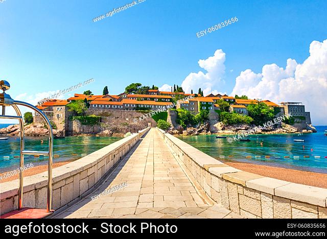 Road to Sveti Stefan, peninsula with ancient architecture in Adriatic sea