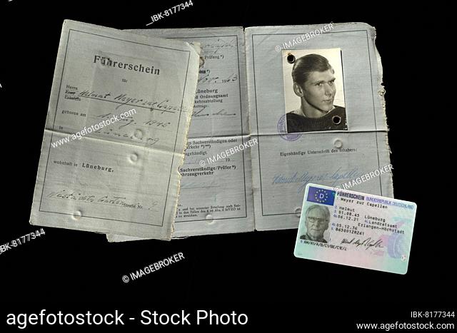 Old driving licence from 1963 and a new driving licence from 2022 in cheque card format on black background, Bavaria, Germany, Europe