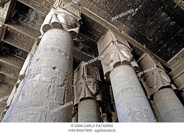 Dendera Egypt, temple dedicated to the goddess Hathor.View of the hypostyle hall with columns and ceiling before cleaning