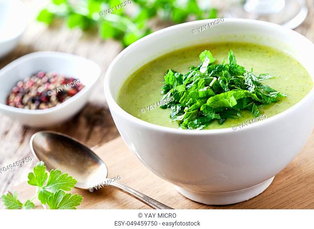 Bowl of Homemade organic broccoli and mint soup