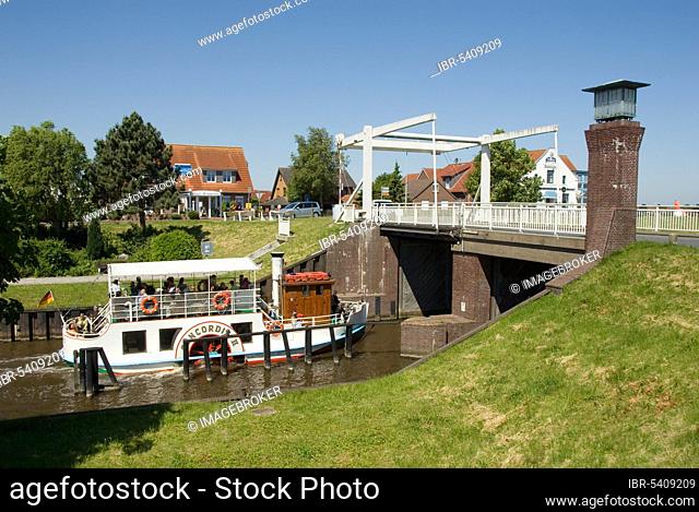 Paddle steamer 'Concordia II' in front of bascule bridge, between Carolinensiel and Harlesiel, East Frisia, Lower Saxony, Germany, Europe