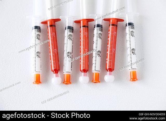 7 syringes in a row