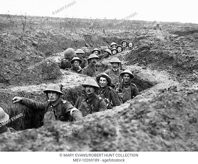 Soldiers of the 11th Inniskilling Fusiliers in a captured German trench at the Battle of Cambrai near Havrincourt on the Western Front in France during World...