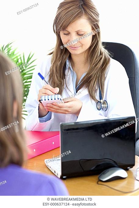 Confident female doctor doing a diagnosis in her office