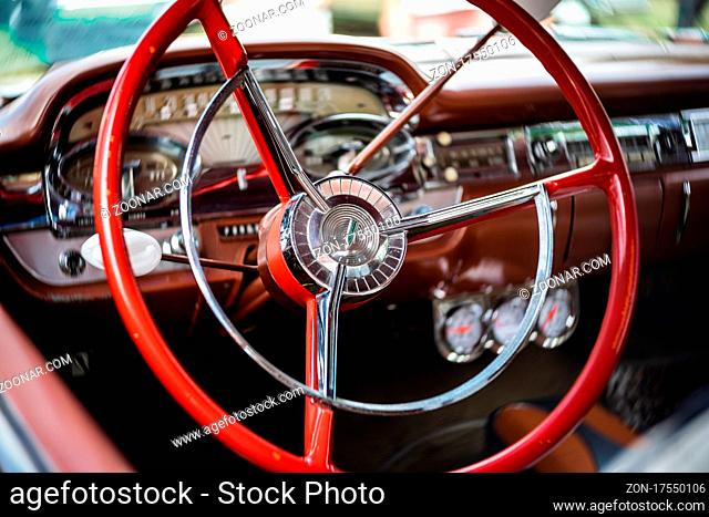 DIEDERSDORF, GERMANY - AUGUST 21, 2021: The interior of full-size car Edsel Corsair coupe, 1959. Focus in the background. The exhibition of