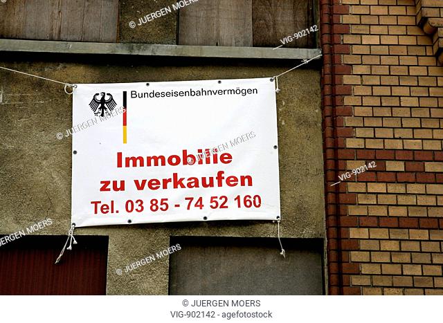GERMANY, GELBENSANDE, 07.07.2008, To sell sign on a railways station building of Deutsche Bahn with the writing - Bundeseisenbahnvermögen - a special authority...