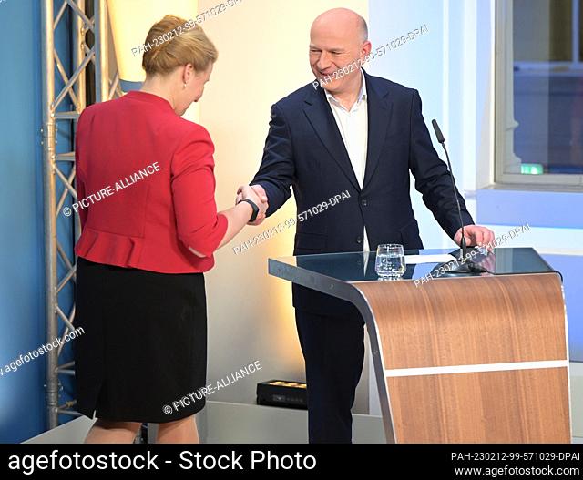 12 February 2023, Berlin: The leading candidates of the CDU and SPD, Kai Wegner and Franziska Giffey, stand in the RBB studio in the House of Representatives...