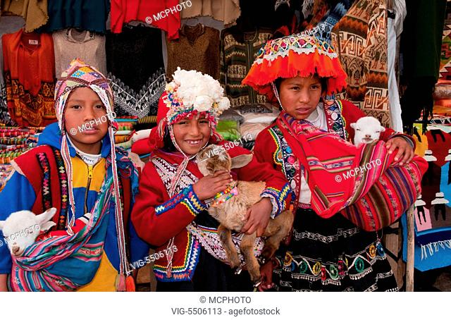 Colorful children in traditional clothes and hats in small town of Pisaq Peru - , 15/08/2008