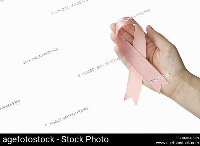 Female hands with pink ribbon isolated on white background. Cancer awareness concept with copy space top view, health care concept Woman space for text