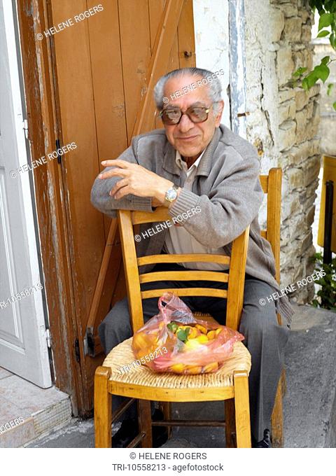 Lefkara Cyprus Man with Oranges