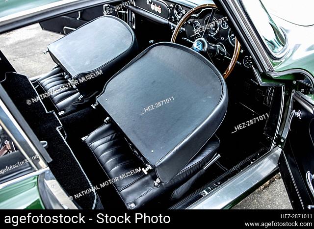 Folded down front seats of a 1961 Aston Martin DB4 GT previously owned by Donald Campbell. Creator: Unknown