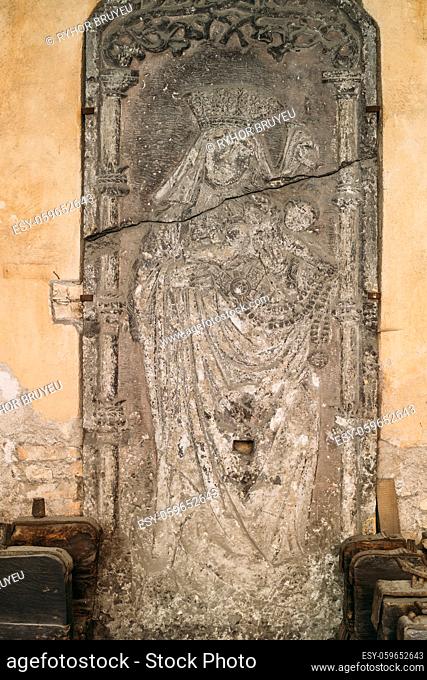 Riga, Latvia. Doorside Stone From The Blackheads House With The Relief Of St Mary In Museum Of Dome Cathedral
