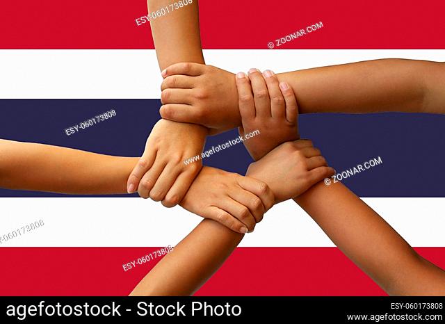 Thailand flag, intergration of a multicultural group of young people
