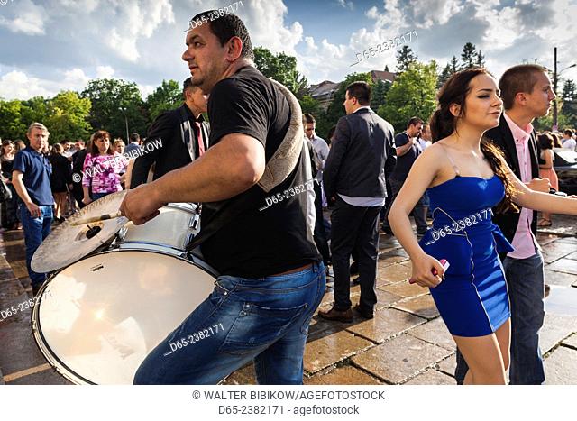 Bulgaria, Sofia, Ploshtad Alexander Nevski Square, Bulgarian students celebrating high school graduation, dancing to Roma-Gypsy bands, NR