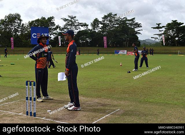 Sri Lankan cricketers Dinesh Chandimal and Angelo Perera having a chat. The picturesque Army Ordinance cricket grounds. Dombagoda. Sri Lanka